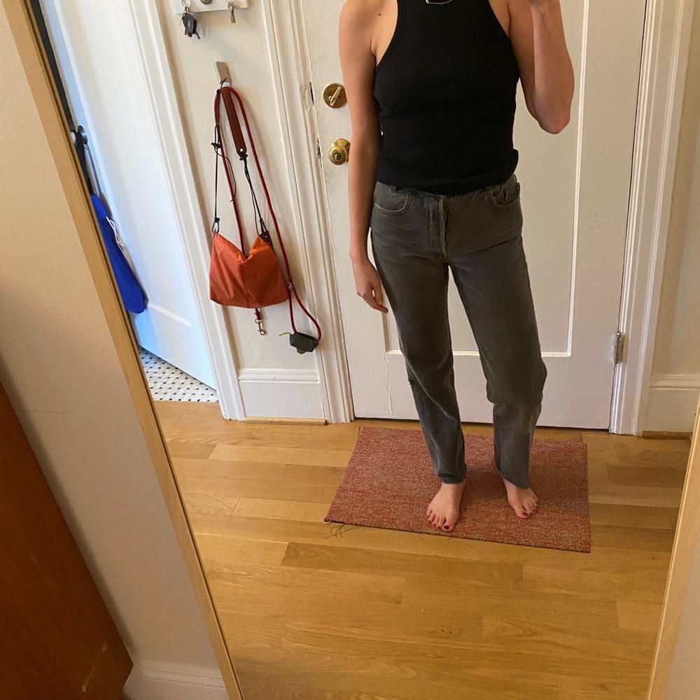 Vintage Levi’s 501s. Fits like a small 25” waist.